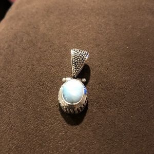 Brand new never used blue stone pendant. Made by sarta jewelry
